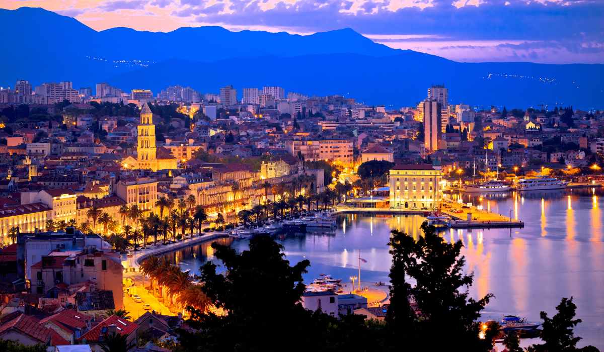 Panoramic night view of Split city and harbor from Marjan hill